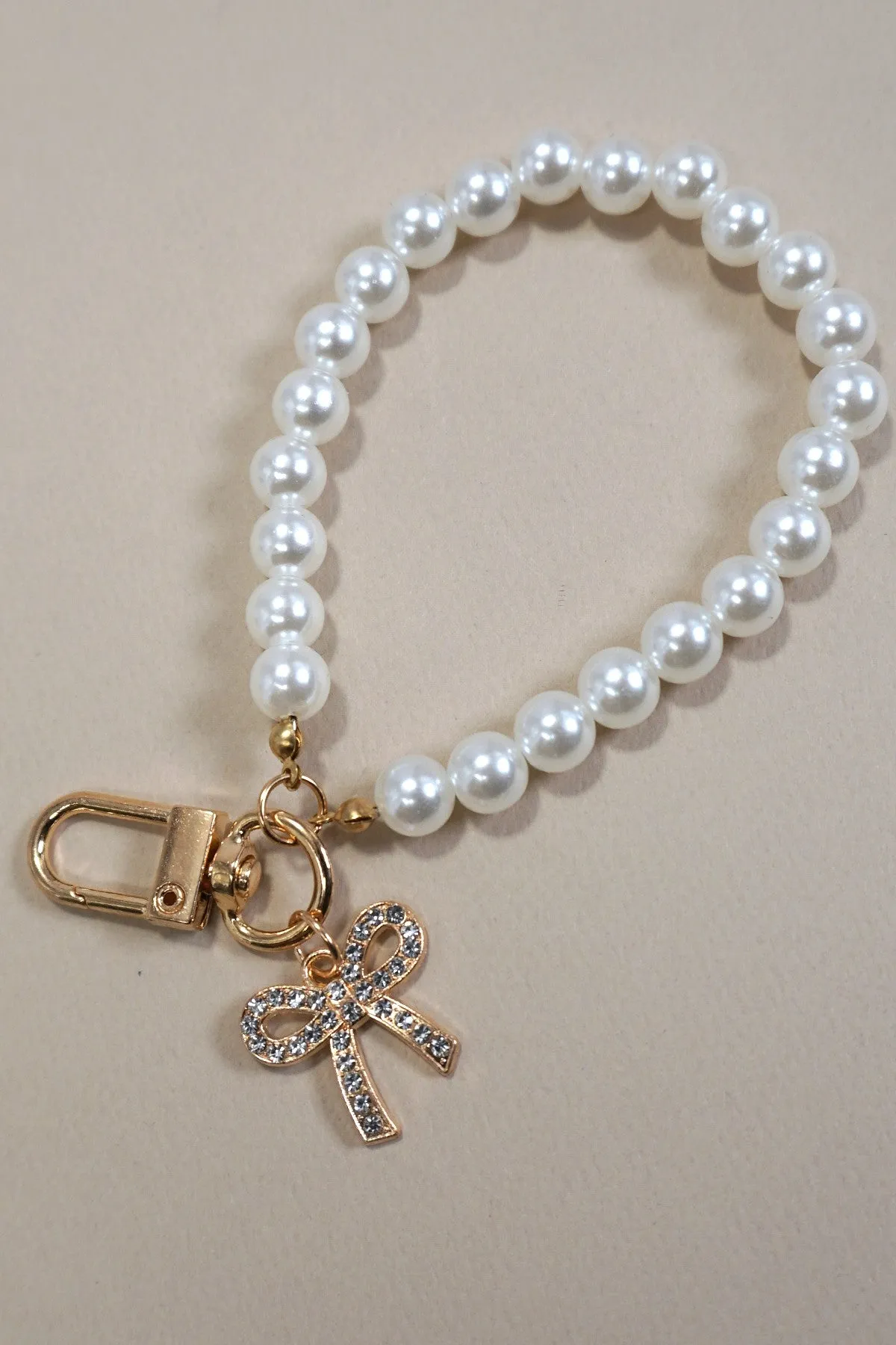 The ‘Pearl Bow Heart Bag Charm’