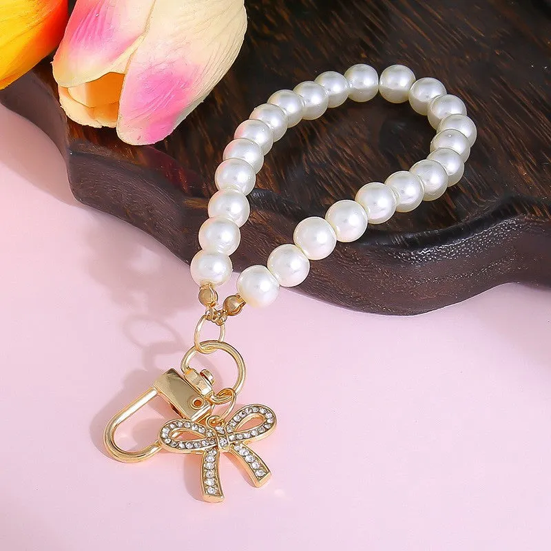 The ‘Pearl Bow Heart Bag Charm’